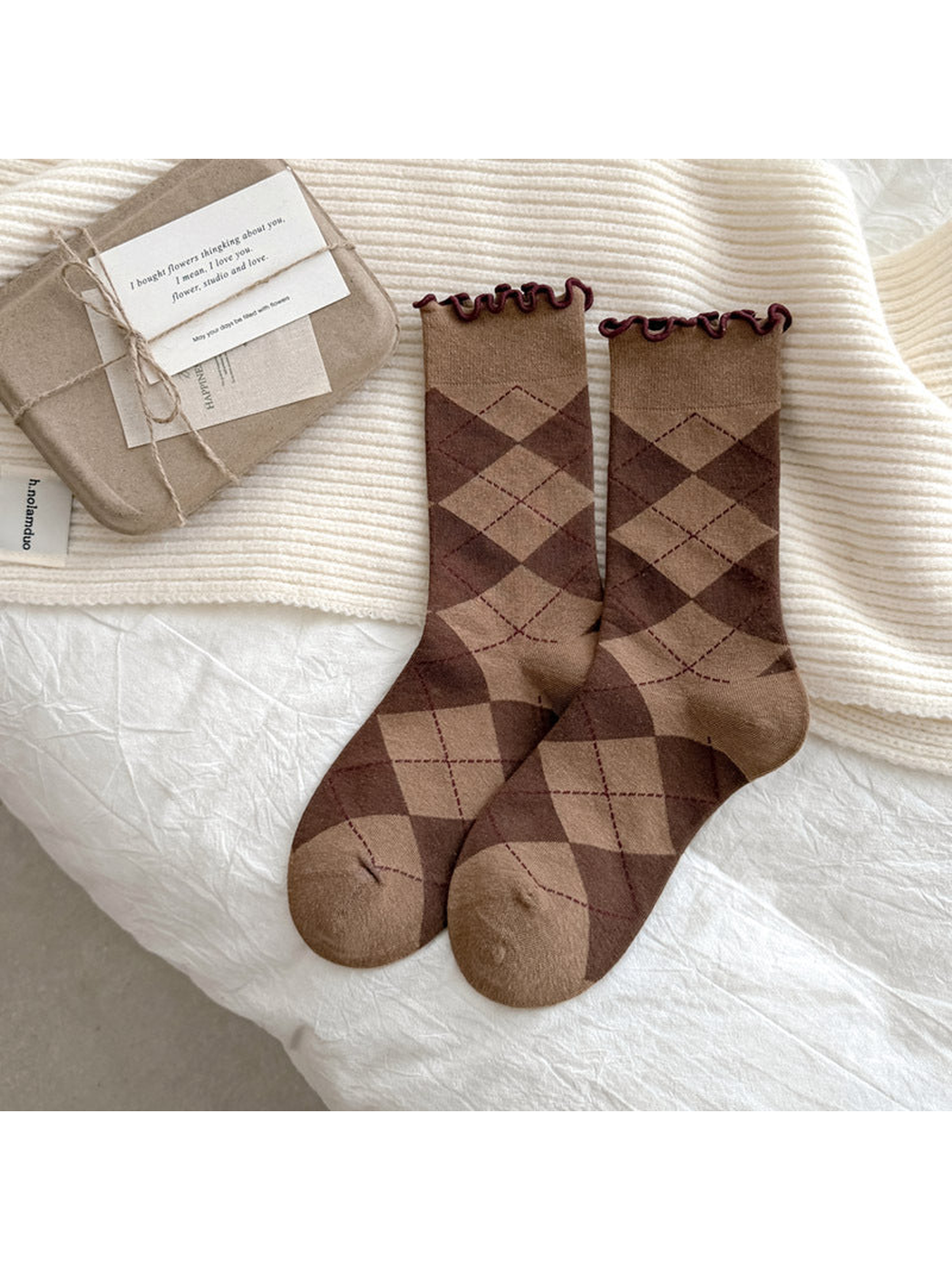 Coffee socks with dark brown argyle diamonds and burgundy wavy cuffs