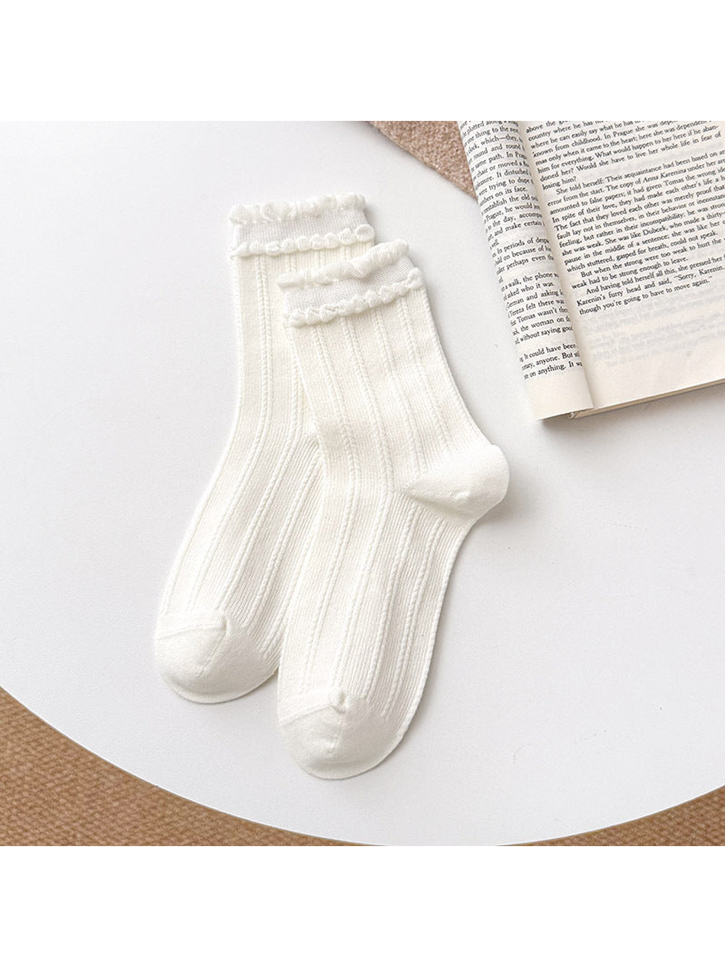 White Double Ruffle socks with vertical ribbing and two ruffled rows at the cuffs.