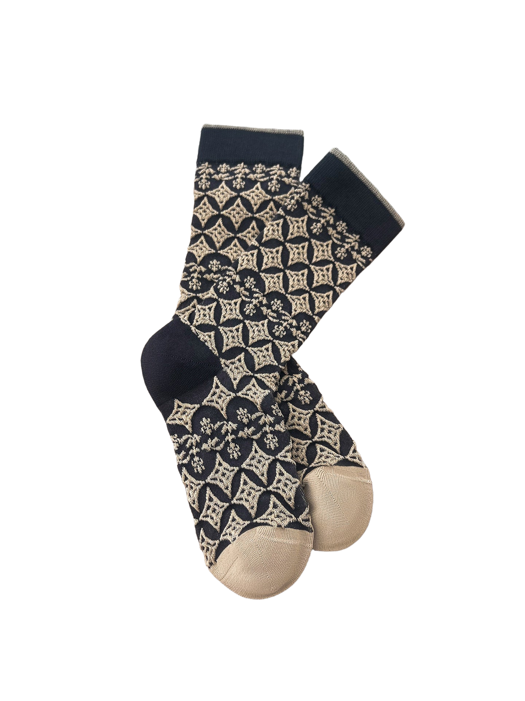 Dark Gray socks with beige diamond and floral patterns arranged on a wooden surface.