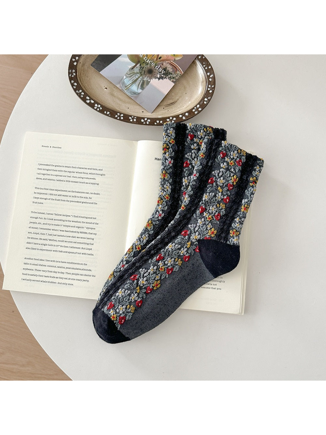 Dark Gray floral socks with black vertical bands and black toe and heel panels.