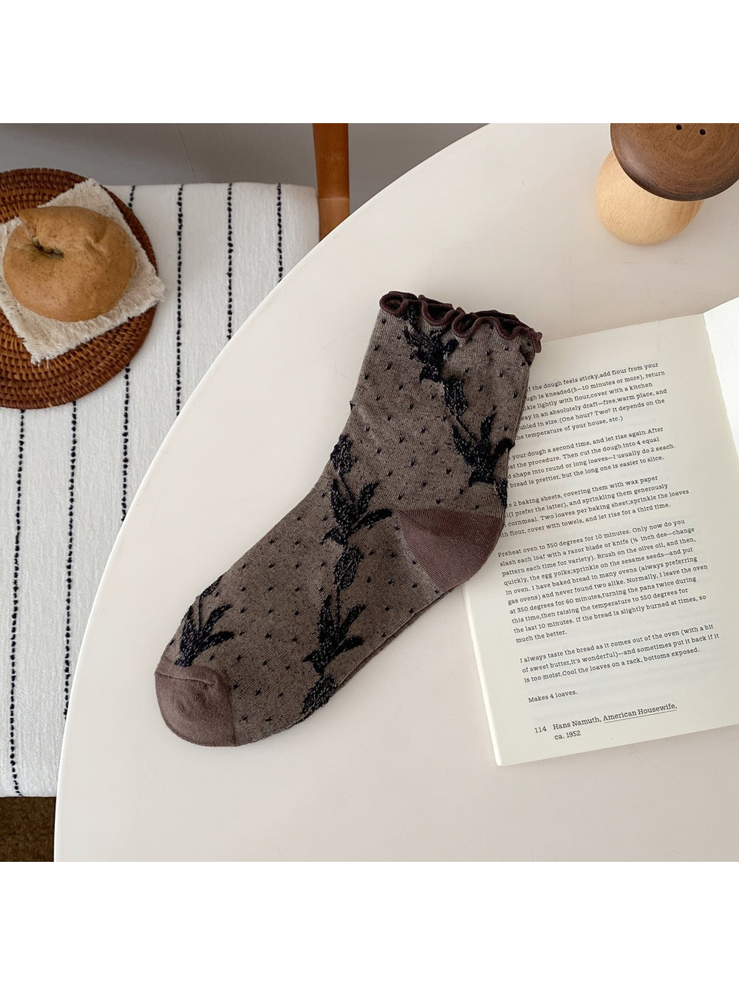 Coffee sock with floral vines, small dots, a ruffled cuff, and contrasting heel and toe panels.