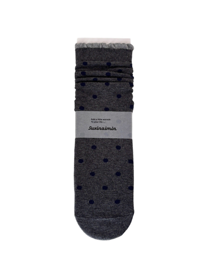 Dark Gray socks with navy polka dots and light gray ruffled cuff trim.
