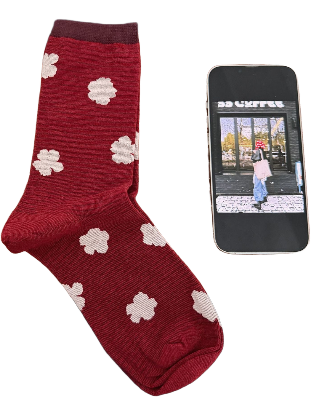 Burgundy sock with ivory flowers and a darker cuff.
