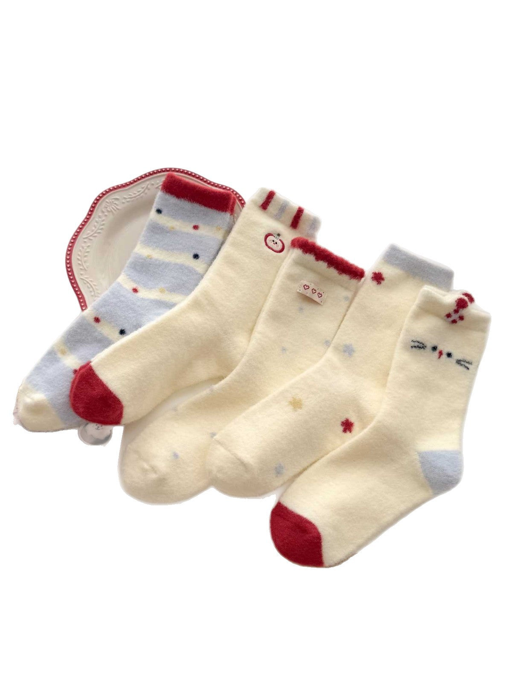 Apple, Stripes, Heart, Star and Cat socks arranged together on a white background.