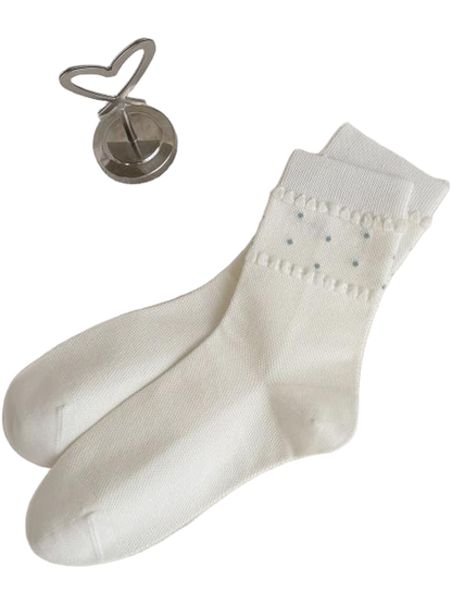 Ivory Dot Bands socks with light blue dots between raised scalloped trim rows.