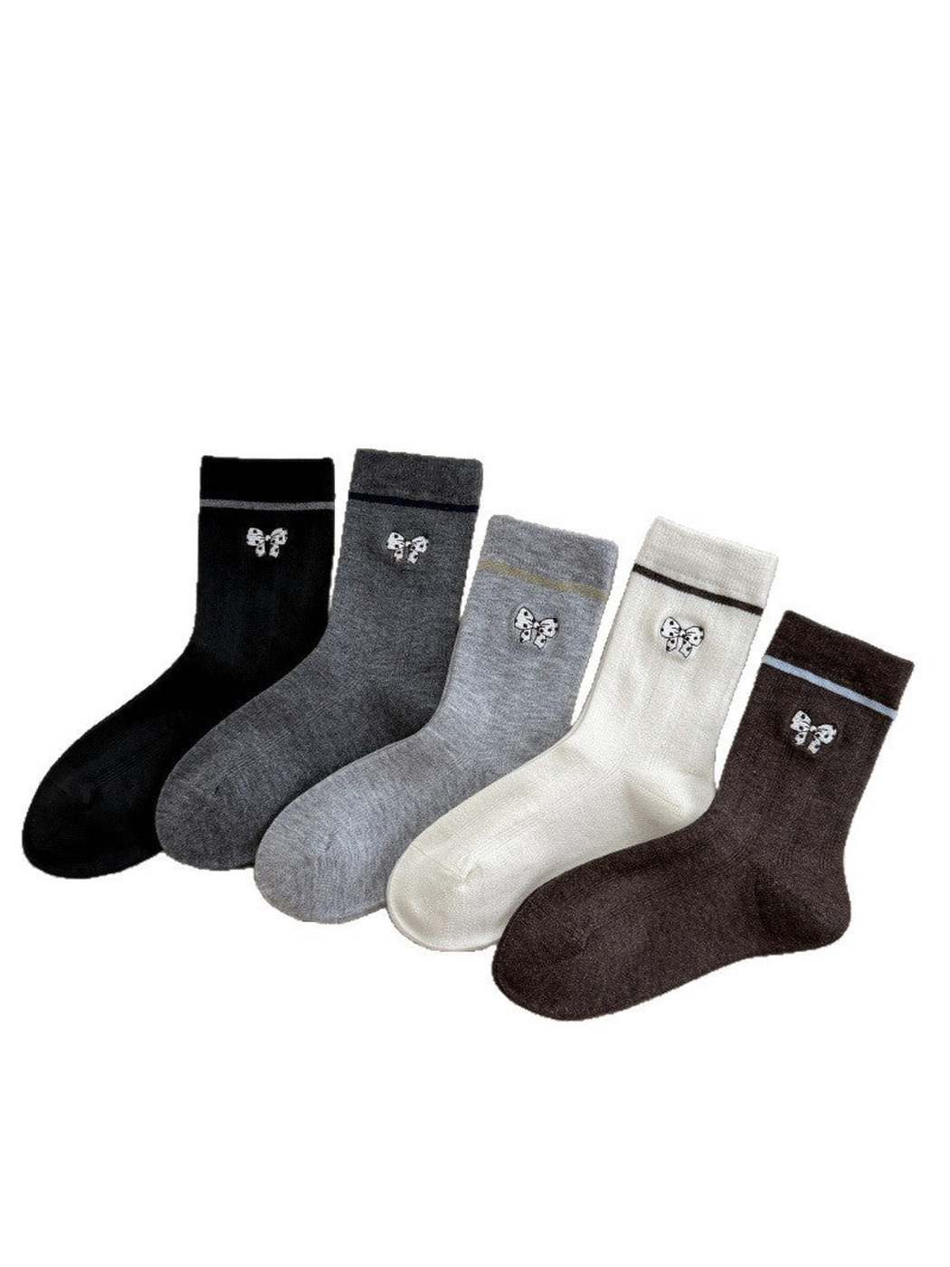 Black, dark gray, light gray, ivory and brown crew socks with spotted bow motifs and contrasting cuff stripes.