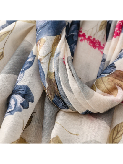 Close-up of the navy, tan, gray and pink print over a fine sheer weave