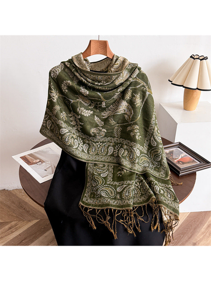 Green bird and paisley scarf styled over a black mannequin