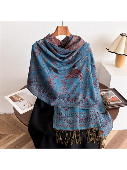 Gray Blue bird and paisley scarf draped over a black mannequin