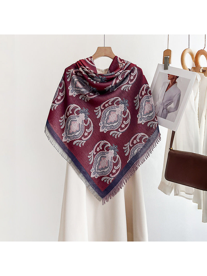 Burgundy paisley square scarf draped over a white dress