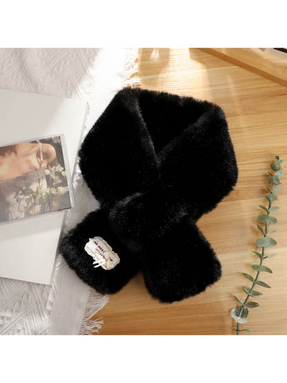 Black fuzzy pull-through scarf with decorative bow patch
