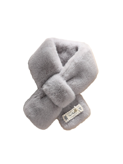 Gray fuzzy pull-through scarf in a crossed display