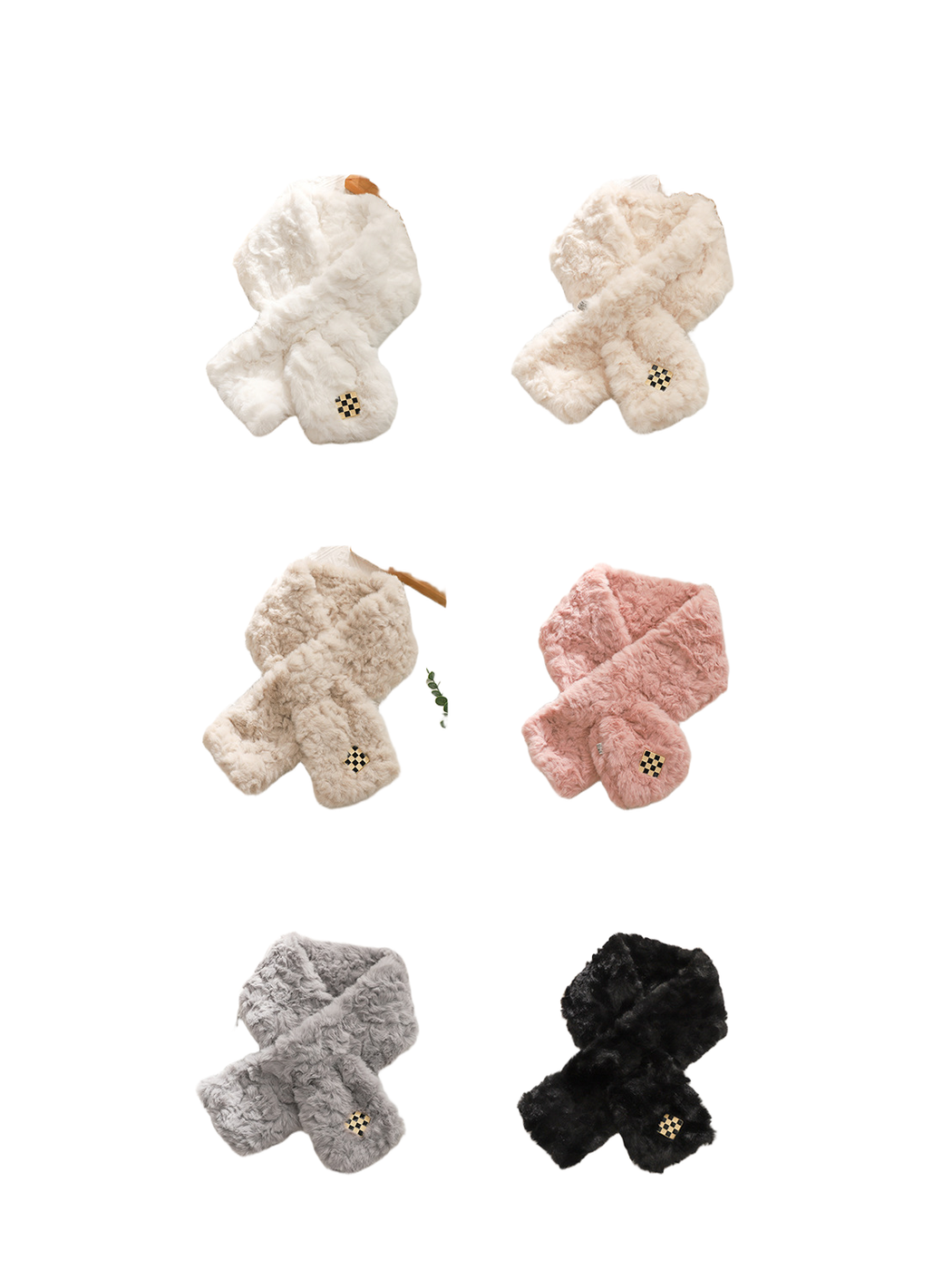 White, cream, beige, pink, gray and black fuzzy pull-through scarves displayed together