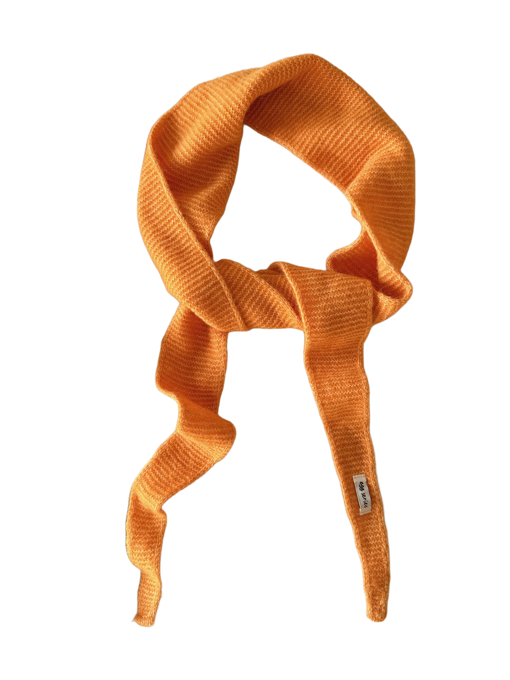 Orange textured narrow scarf with tapered ends arranged in a loose knot