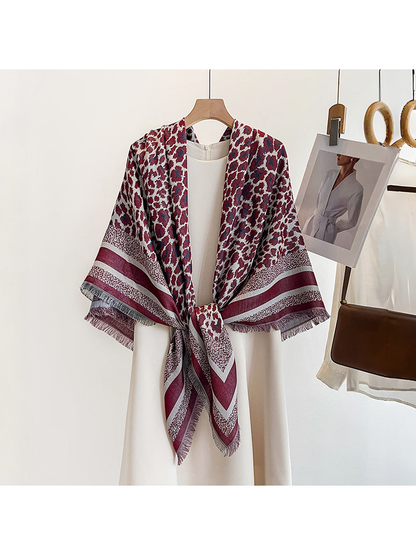 Burgundy animal-print square scarf styled in a tied front drape