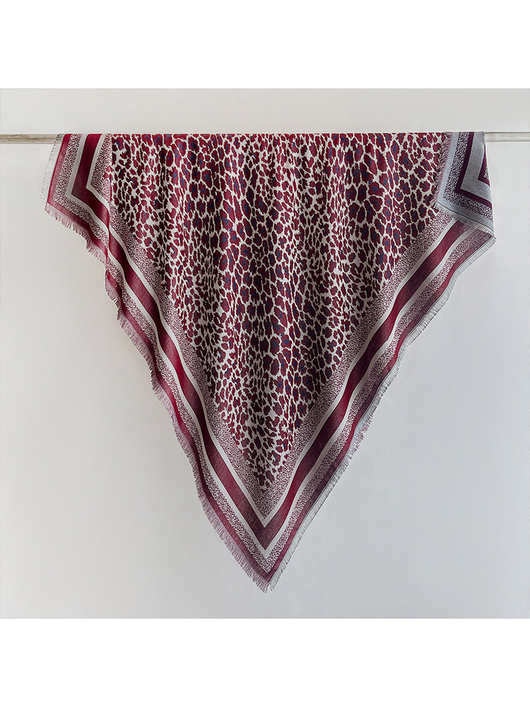 Burgundy animal-print square scarf with striped border and short fringe