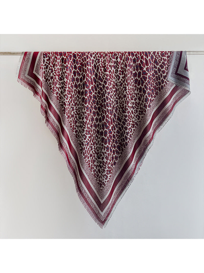 Burgundy animal-print square scarf with striped border and short fringe