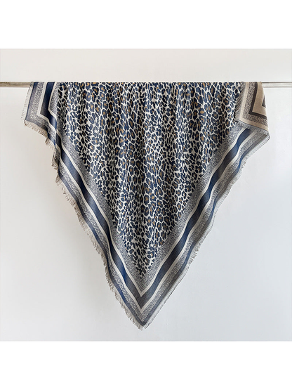 Navy animal-print square scarf with striped border and short fringe