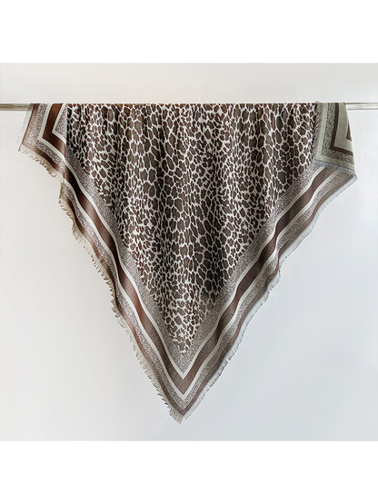 Light brown animal-print square scarf with striped border and short fringe
