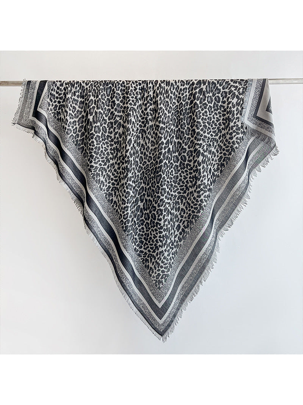 Black animal-print square scarf with striped border and short fringe