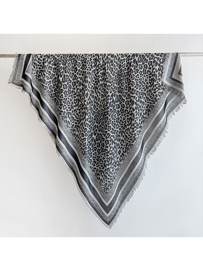 Black animal-print square scarf with striped border and short fringe