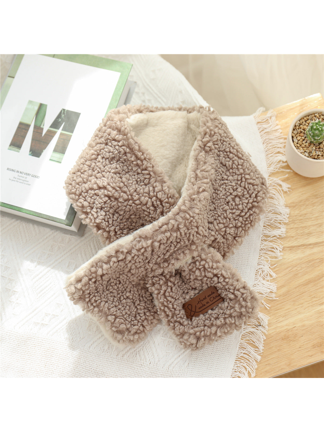 Beige short neck scarf with crossed ends and cream plush lining
