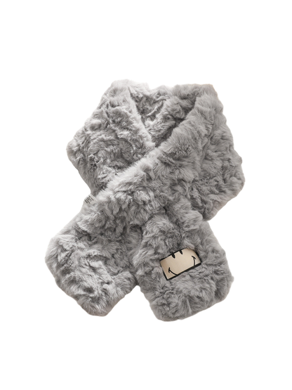 Gray fuzzy scarf with an outlined smiling face patch