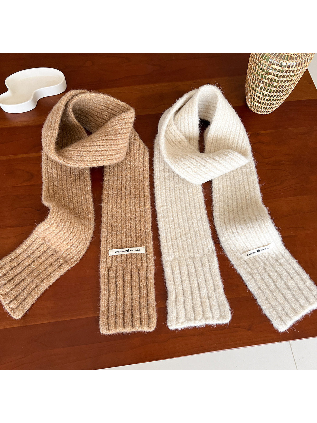 Camel and ivory ribbed scarves displayed at full length