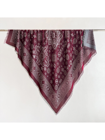 Burgundy geometric square scarf with fringed edges, full view