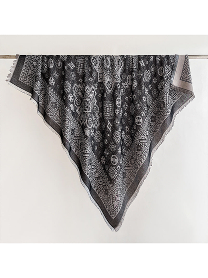 Black geometric square scarf with fringed edges, full view