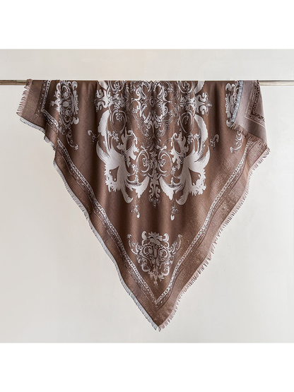 Light brown square scarf with ornamental motif and fringed edges