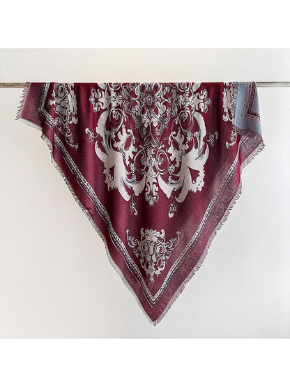 Burgundy square scarf with ornamental motif and fringed edges