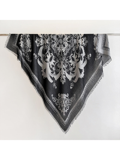 Black square scarf with ornamental motif and fringed edges