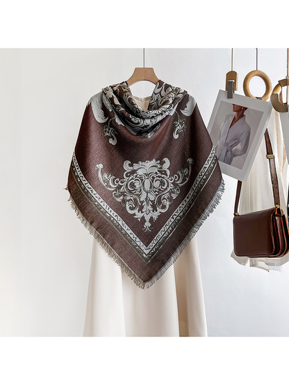 Dark brown ornamental scarf arranged in a centered triangular drape