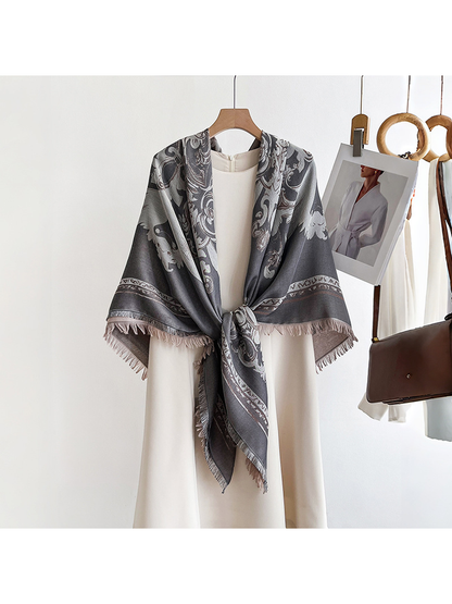 Gray ornamental scarf draped over the shoulders and tied at the front