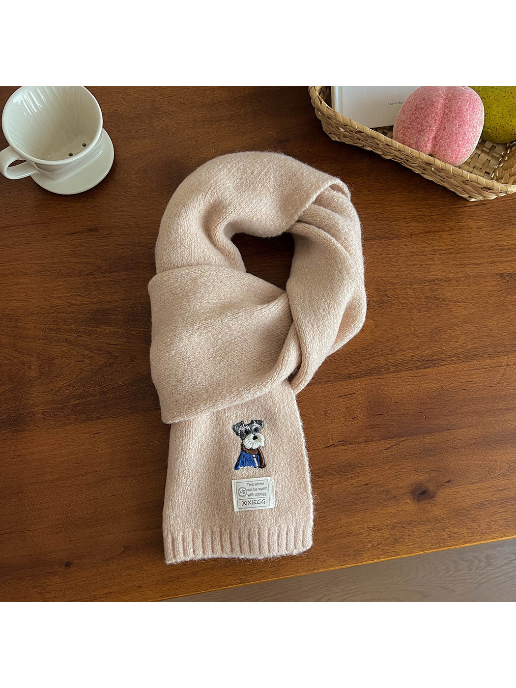 Cream fuzzy scarf with embroidered dog motif and ribbed end