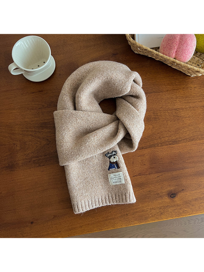 Khaki fuzzy scarf with embroidered dog motif and ribbed end