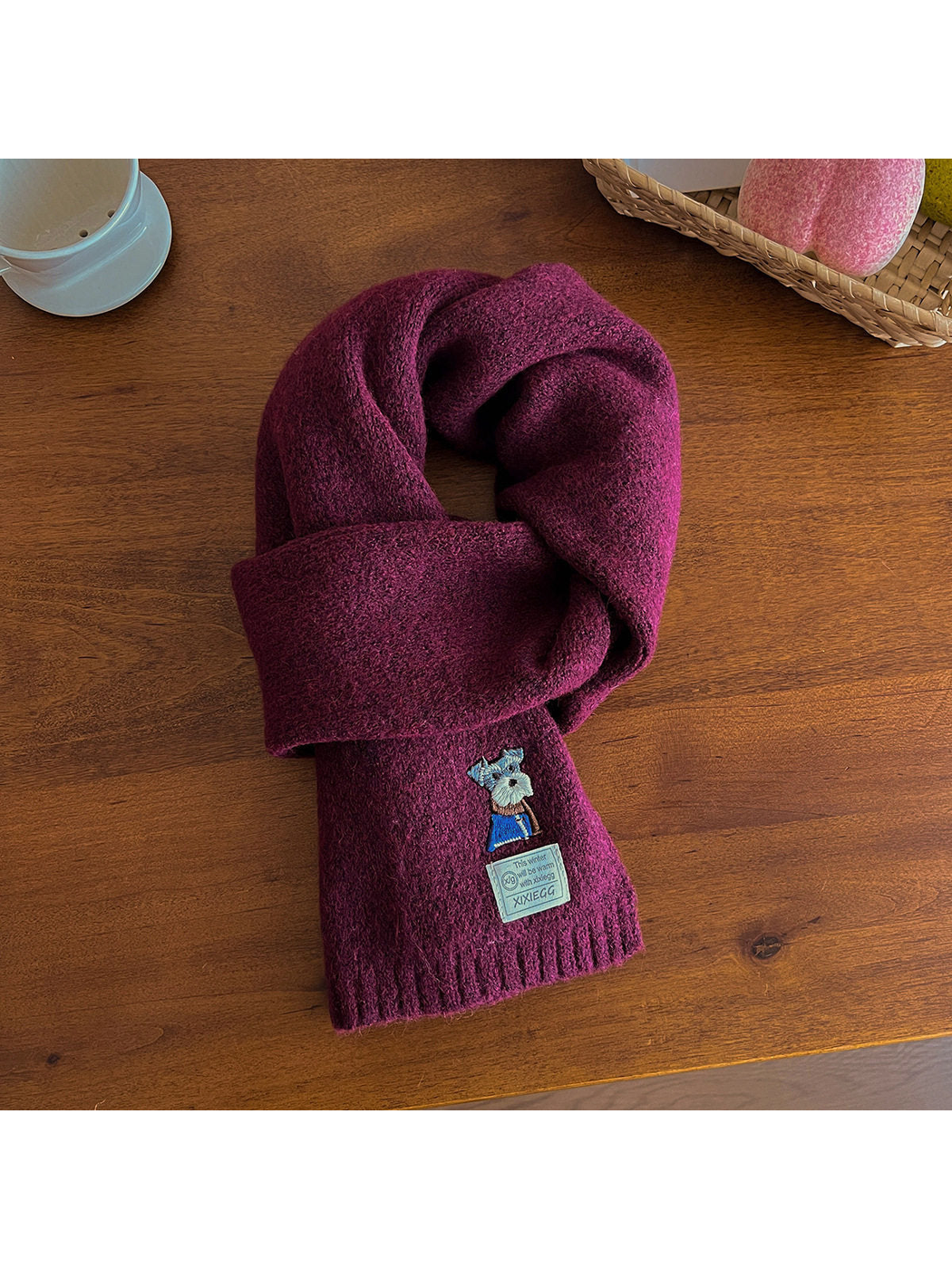 Deep purple fuzzy scarf with embroidered dog motif and ribbed end