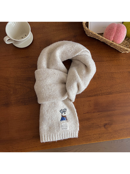 Ivory fuzzy scarf with embroidered dog motif and ribbed end