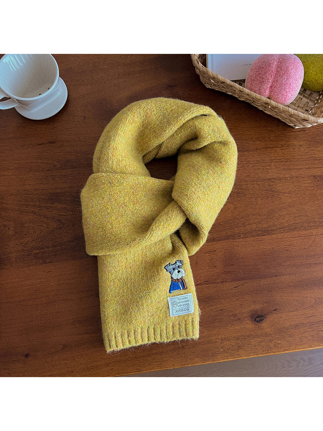 Mustard yellow fuzzy scarf with embroidered dog motif and ribbed end