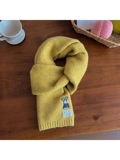 Mustard yellow fuzzy scarf with embroidered dog motif and ribbed end