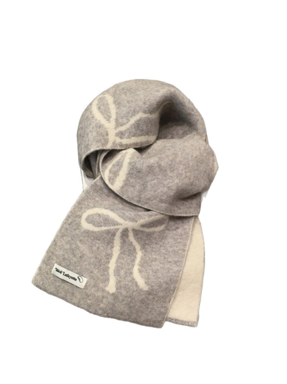 Gray rectangular scarf with cream bow motifs on a white background