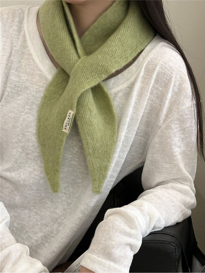 Green pull-through scarf with tapered ends, worn view