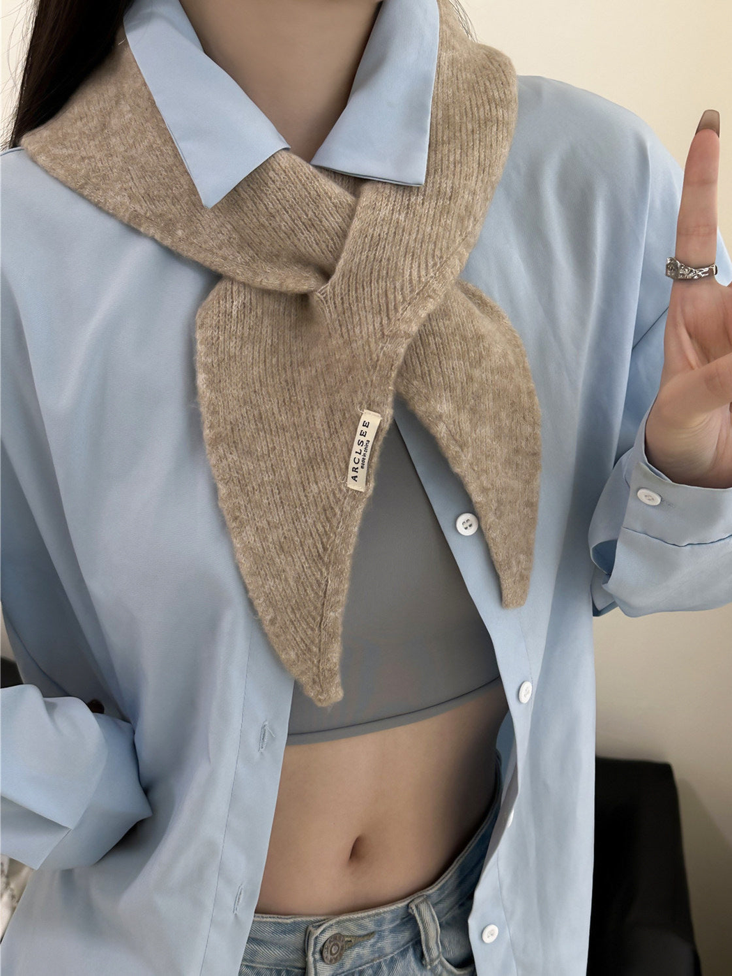 Khaki pull-through scarf with tapered ends, worn view
