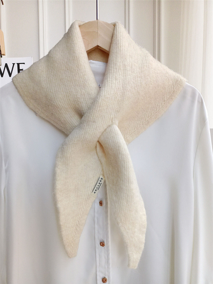 Ivory pull-through scarf displayed on a white shirt