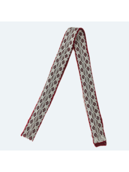 Red lace-trim skinny scarf in a full-length folded view
