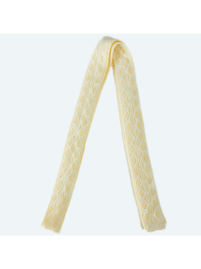 Cream lace-trim skinny scarf in a full-length folded view
