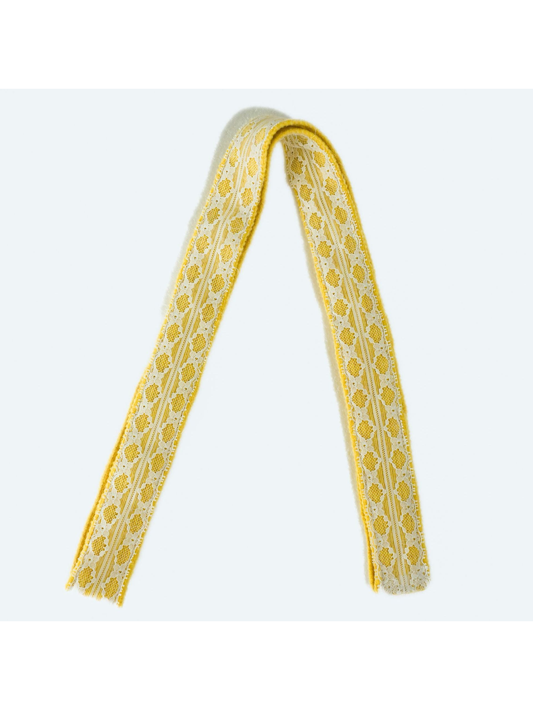 Yellow lace-trim skinny scarf in a full-length folded view