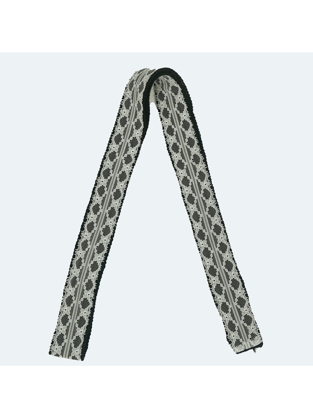 Black lace-trim skinny scarf in a full-length folded view