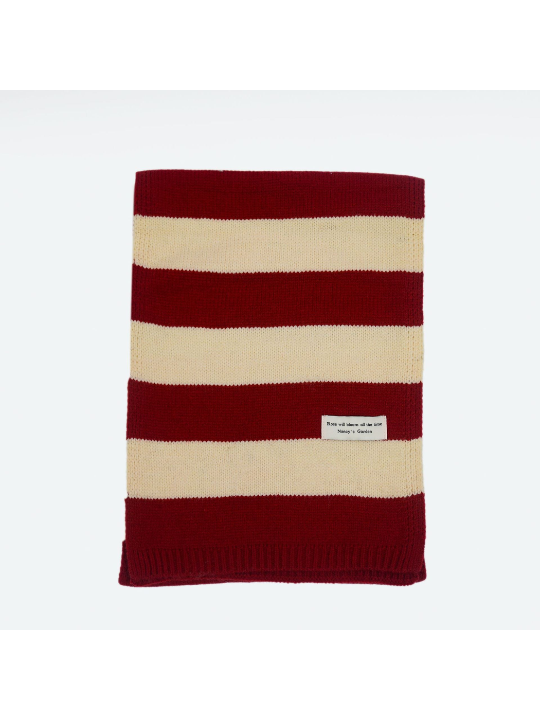 Folded red and cream wide-striped scarf